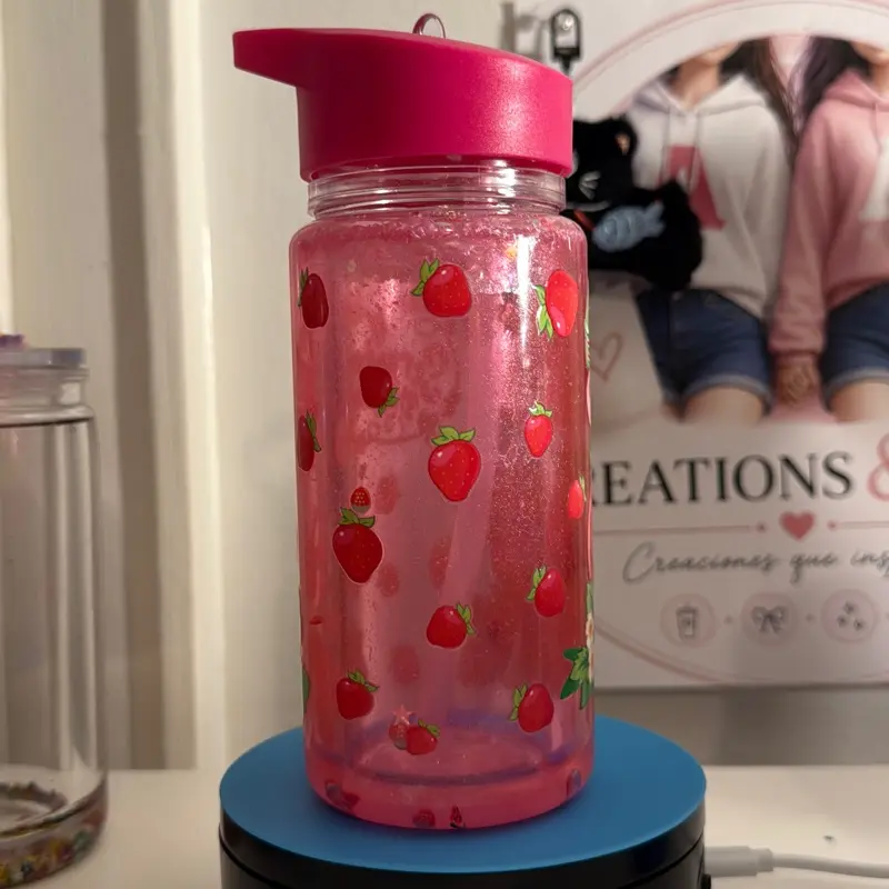 Strawberry Patterned Pink Water Bottle with Pink Lid and Blue Base 10oz Capacity