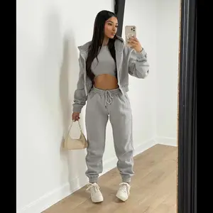Women’s three-piece pants set with a fleece-lined hooded sweatshirt for sporty, casual wear