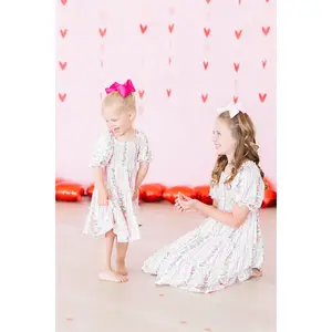 Rosebud Bows Smocked Ruffle Dress