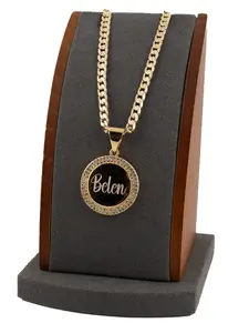 Exclusive, fully customizable circular pendant in gold overlay, includes an 18 or 24-inch Cuban-style chain. Don't forget to leave the name in a note or message.