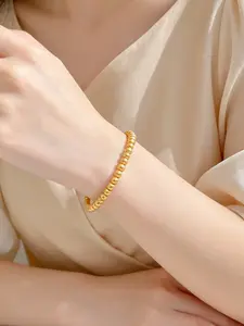 Luxurious golden bead open bangle, waterproof and hypoallergenic, exquisite and versatile for layered wear, an ideal accessory for daily commutes