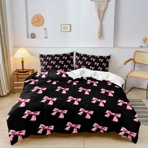Black and pink bow-print soft bedding set, including duvet cover and pillowcases, creating a personalized and trendy bedroom décor.