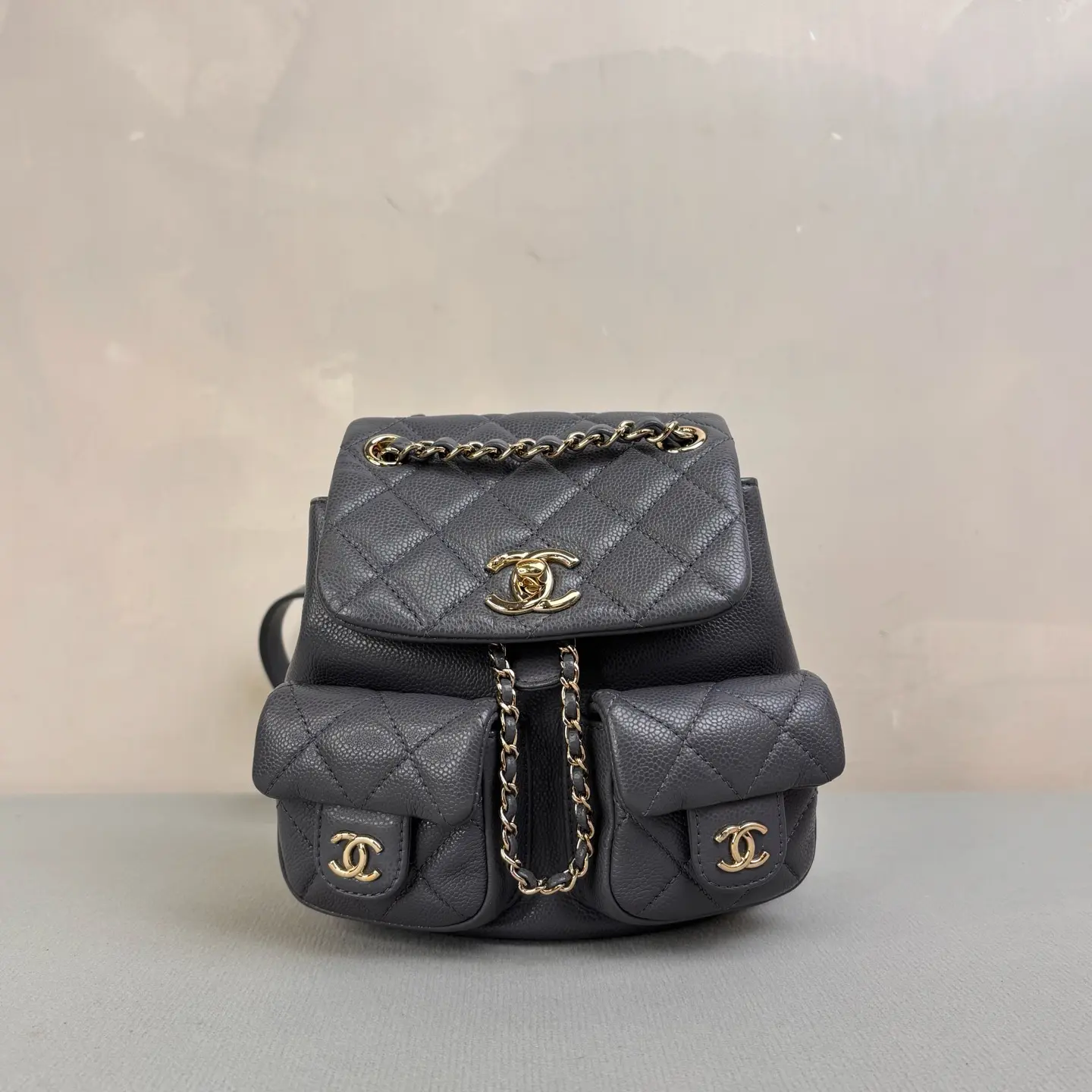 Pre-owned CHANEL Shiny Caviar Quilted Small Duma Pockets Drawstring Backpack Grey