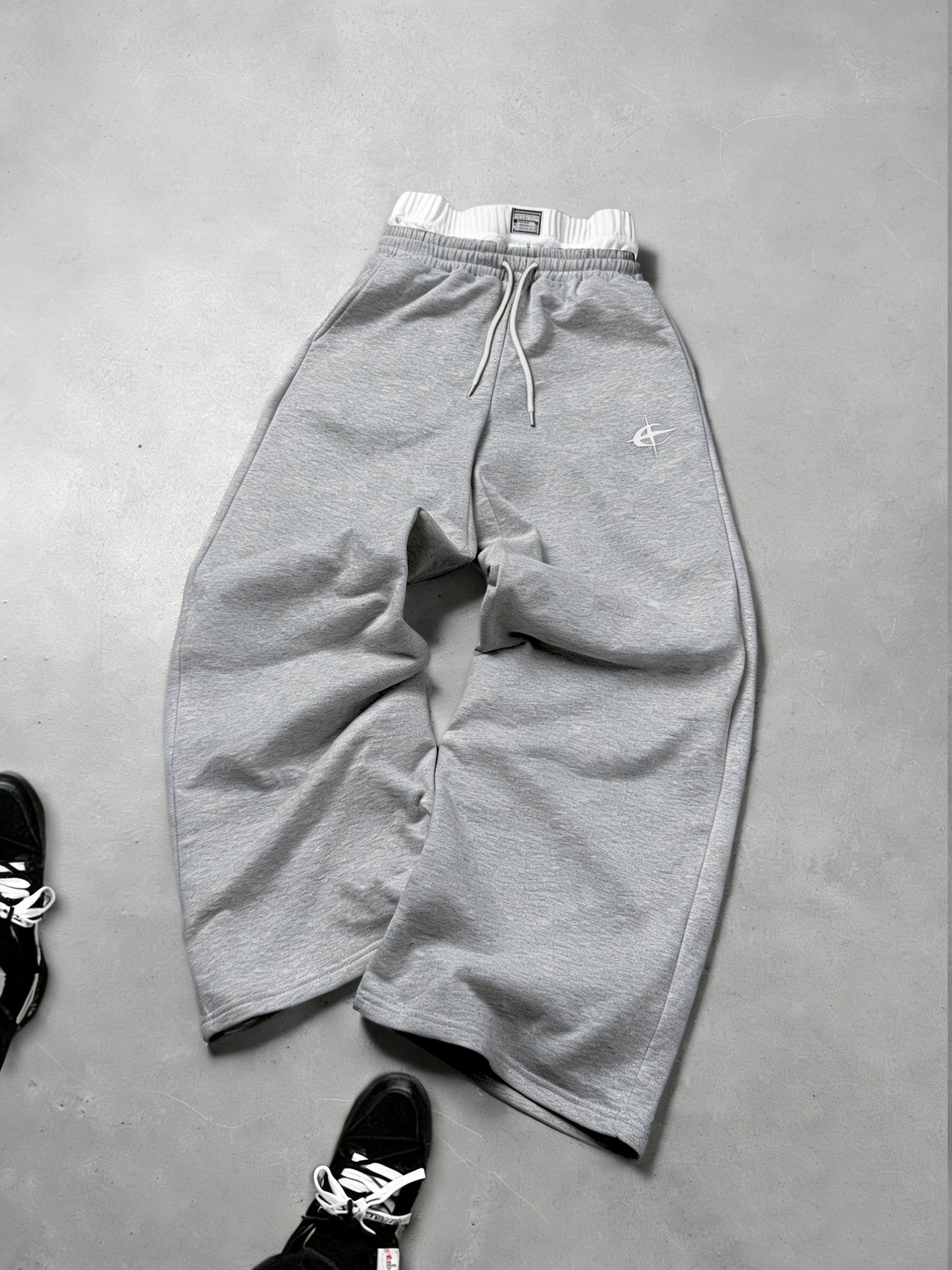 Gray sweatpants with embroidered logo, Y2K American street casual joggers, loose casual knitted sports pants featuring a drawstring and faux two-piece design with contrasting double waistband, perfect for everyday wear and trendy gatherings.
