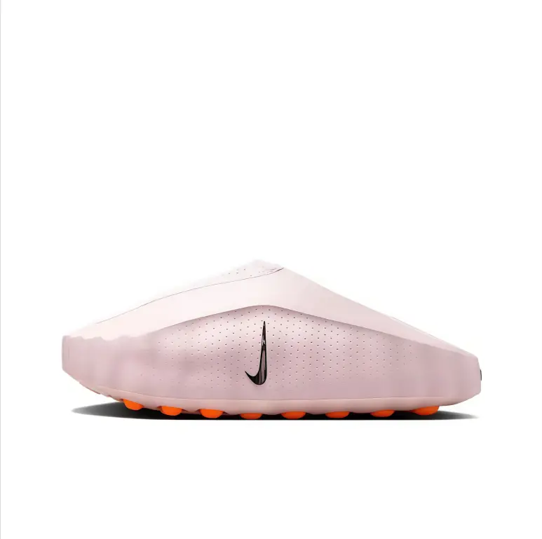 Slip‑on mule clogs soft pale pink perforated upper orange bubble pod outsole black side logo gentle pastel tone lightweight cushioned beach pool daily street unisex fashion footwear