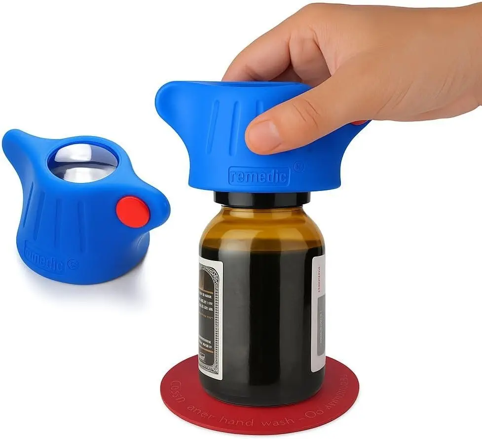 Remedic One-Hand Pill Bottle Opener – Magnifier & LED Light Aid | Non-slip mat secures bottles for one-hand opening. Magnifier and LED light help read medication labels. Gift