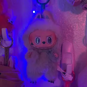 Labubu plush serenity - Adorable Pink Plushie with Large Eyes and Soft Texture