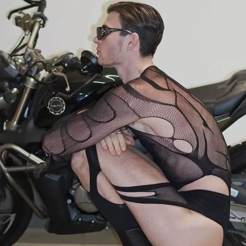Illussy 2025 Edgy Men's Fishnet Bodysuit with Daring Cut-Outs & Easy-Access Opening. This provocative full-body mesh lingerie is designed to show off your physique, perfect for pride events, parties, or a bold night out. Embrace your confidence