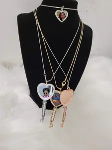 Heart and Key Diamond Bezel Pendants