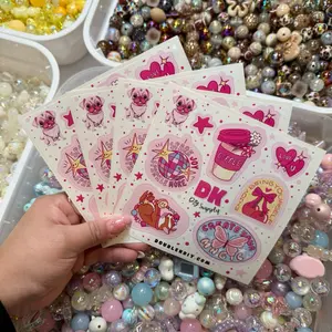 1pc - DK Sticker Sheet with 7 stickers, with various designs, pink animals and decorative elements.