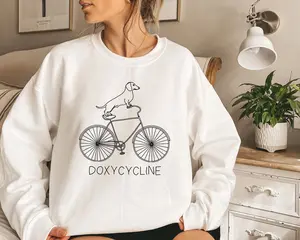 Funny Doxycycline T-Shirt, Sweatshirt & Hoodie - Dachshund Bicycle, Pharmacy Gift, Pharmacists & Technicians, Veterinary Cotton Crewneck