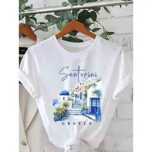 Women's Santorini Greece Pattern Printed T-Shirt - White Short Sleeve Casual Crew Neck Top, With Blue Domed Roofs And Lush Greenery Design, Lightweight Spring/Summer Travel Souvenir, Single's Party Gift, Spring Casual Wear | Vibrant Graphic Tee