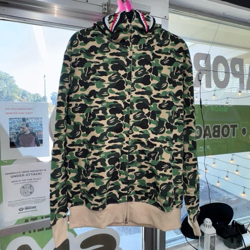 A Bathing Ape Camo Jacket with Orange Logo and Hoodie Design for Men