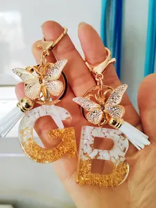 1pc Chic Alphabet & Butterfly Resin Keychain with Tassel - Golden-Tone, Glittery Letter A Design, Friendship & Love Themed, Rectangular Shape for Autumn/Winter Fashion Accessory