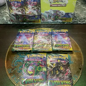 POKEMON: EVOLVING SKIES 5 PACK BUNDLE( 5 FACTORY SEALED BOOSTER PACKS FROM FACTORY SEALED BOOSTER BOXES)