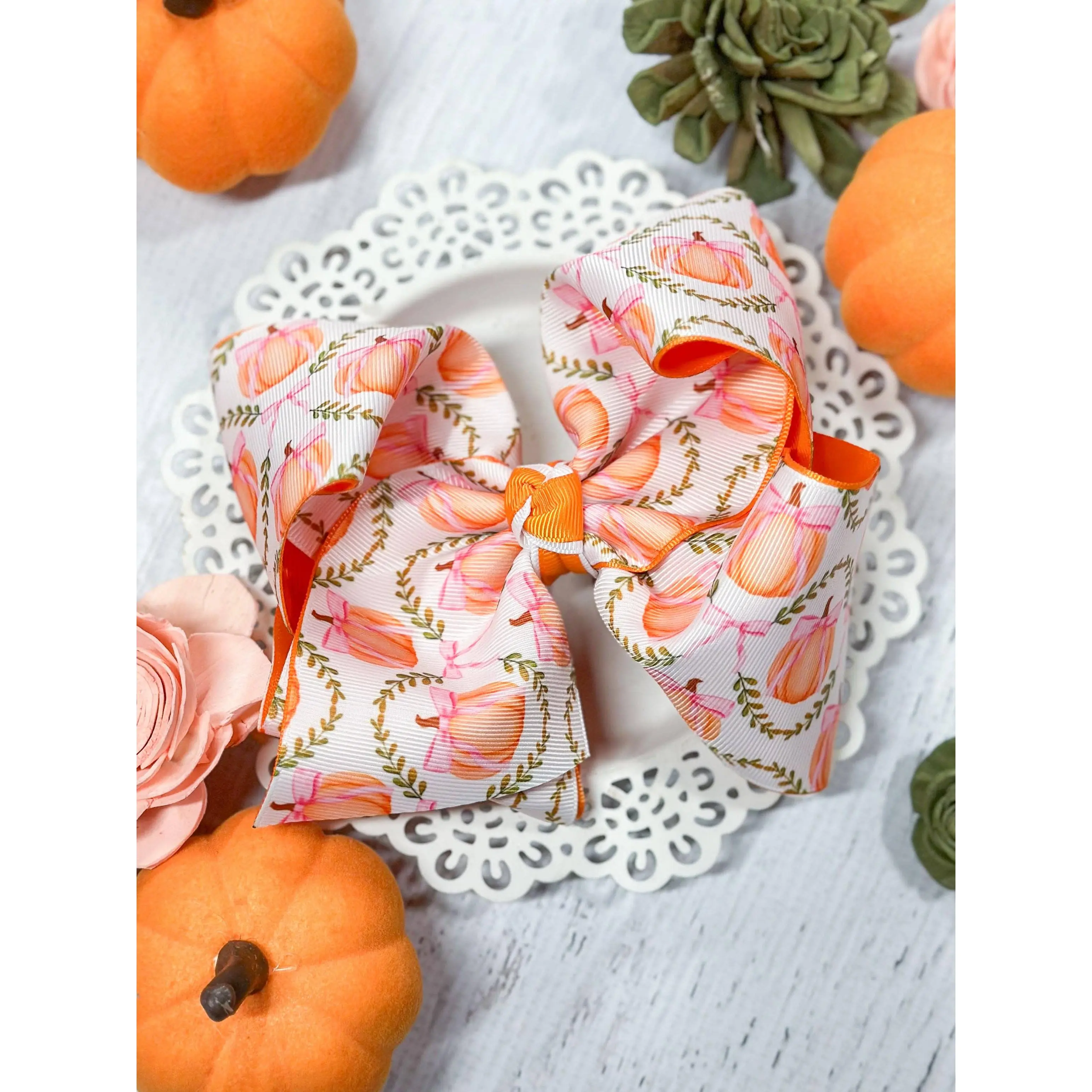 Double Layered Pumpkin Hair Bow $10.00 Double Layered Pumpkin Hair Bow $10.00