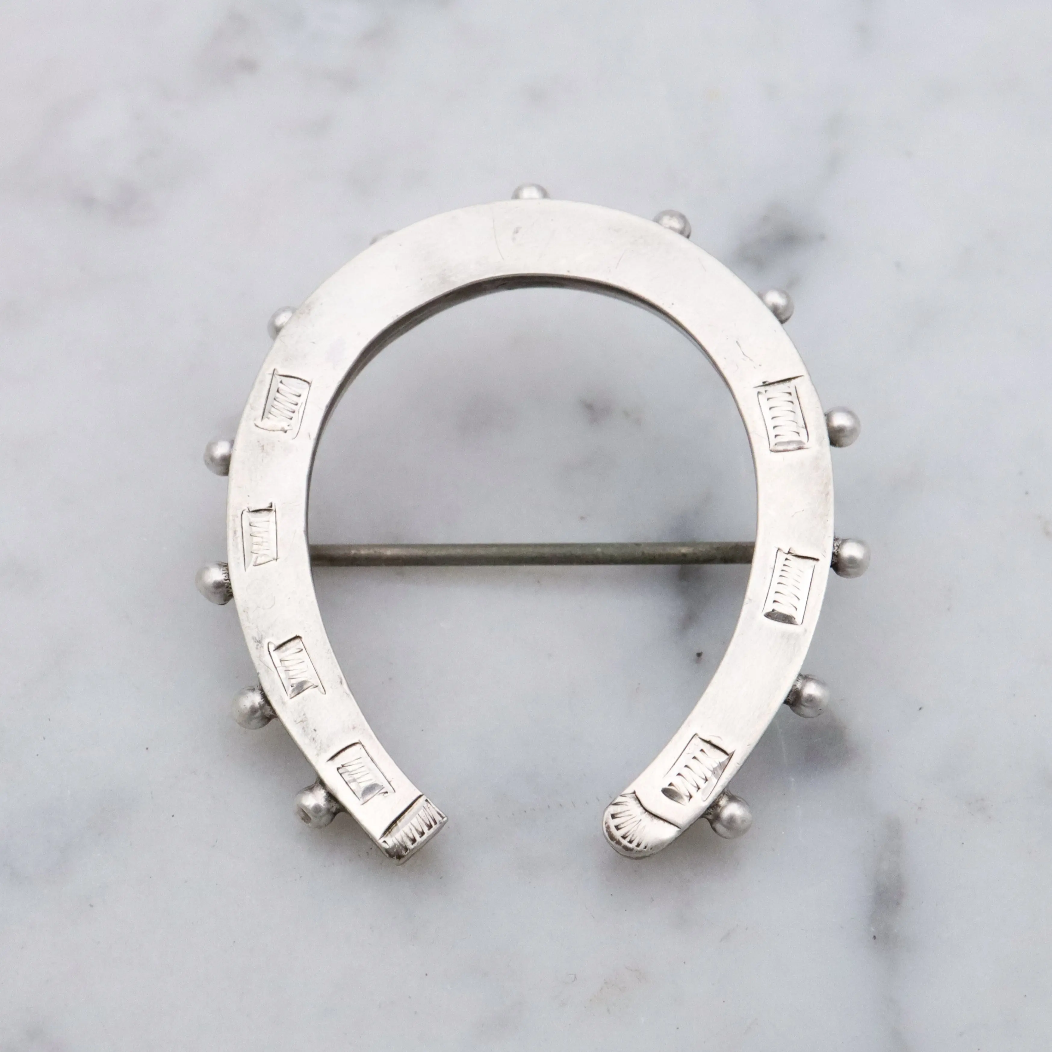 Victorian English sterling handmade horseshoe brooch