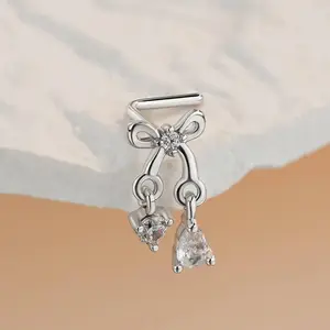 Oufer Clear CZ Dangel Bow L-Shaped Nose Stud with Sparkling Cubic Zirconia Stones for Secure Comfortable Fit Cubic Zirconia