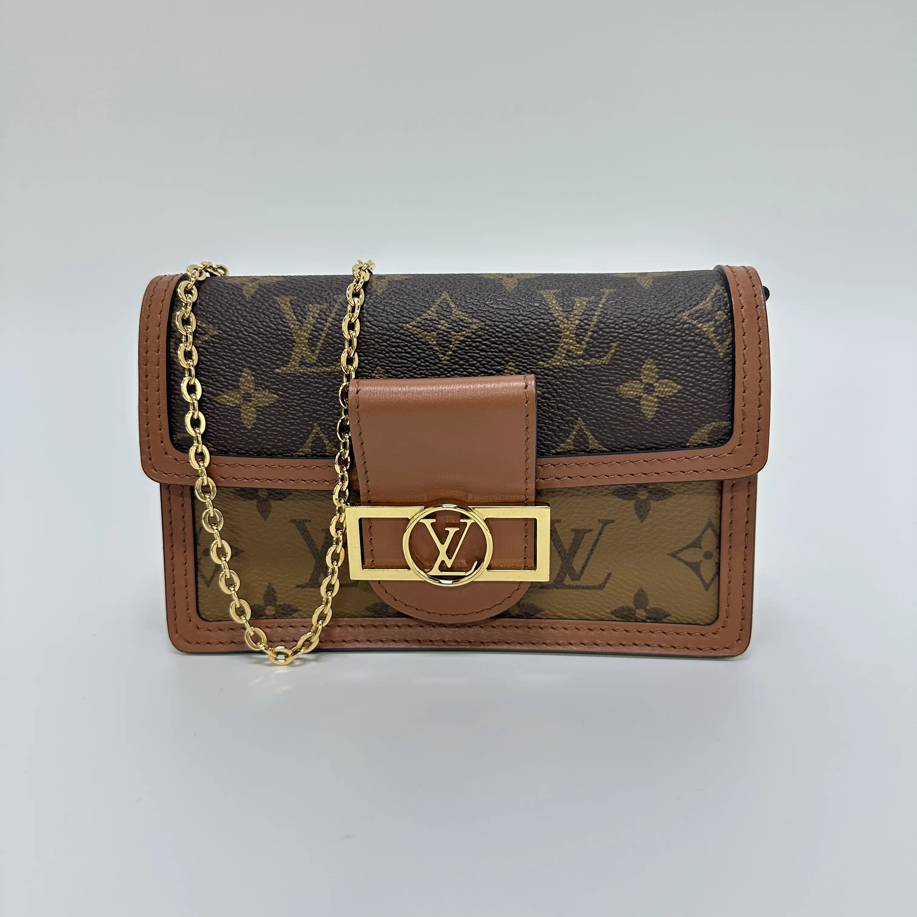 Pre-owned Louis Vuitton Dauphine WOC Reverse Monogram Chain Crossbody Bag