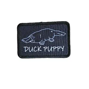 Duck puppy duck billed platypus black meme funny  2"x3" morale patch with hook and loop backing