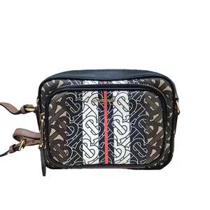 Pre-owned BURBERRY Camera Bag Stylish Crossbody with Monogram Design Adjustable Strap for Everyday Use Camera Compatible Versatile for Various Occasions