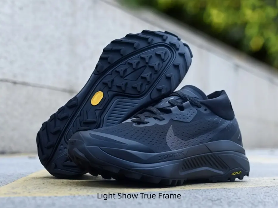 Solid black perforated mesh uppers make these athletic shoes fit weekday office commutes, the dark stain-resistant shade elevates monochrome streetwear for shopping trips and relaxed weekend city hangouts with pals.