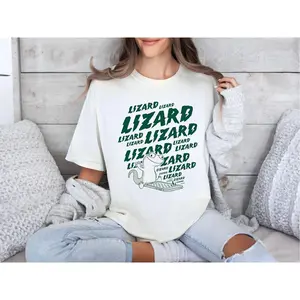 T-shirts and sweatshirts printed with images from the movie Tom The Lizarddd 2026 in a retro style, funny t-shirts, unisex Lizarddd 2026 t-shirts, unisex pullover sweaters
