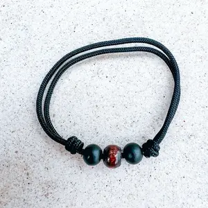 Handmade Minimalistic Bracelet with Wooden Beads and Adjustable Slipknot cord bracelet