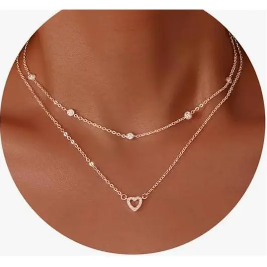 Silver necklace with diamond studded hea