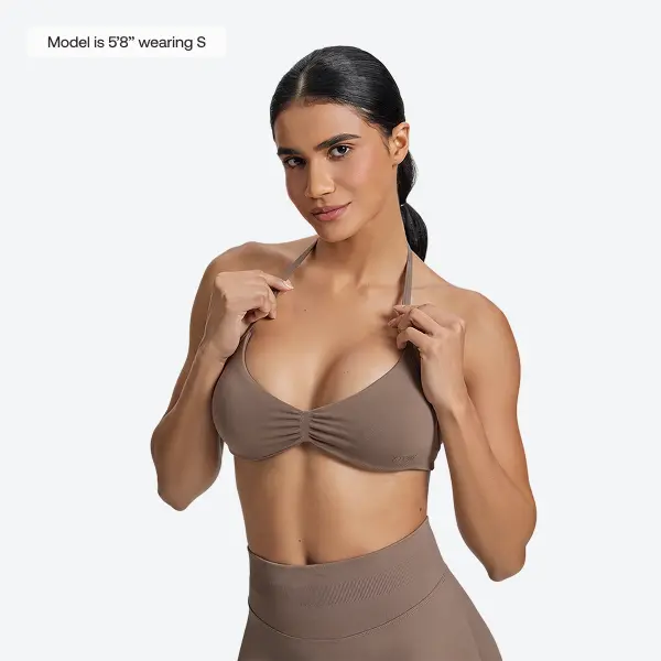 BetterMe Women's Supportive SculptMe Halterneck Backless Wireless Seamless Sports Bra, Dusty Taupe Nylon Blend Athletic Fitted Plain Top for Yoga, Workout Clothes Women with Haltered Straps