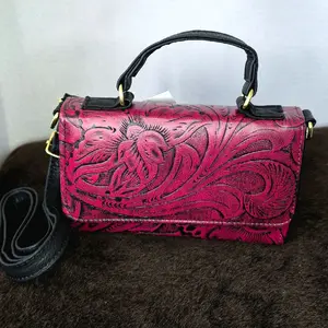 Crossbody Embossed Leather Bag with Floral Design and Gold Hardware