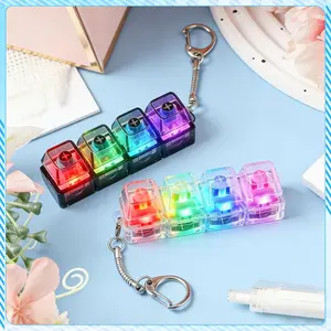 Fidget Toy Keyboard Keychain with Clear Keycaps Blue Centers Colorful lights and Crisp Clicking Sounds for Stress Relief and Desk Accessories