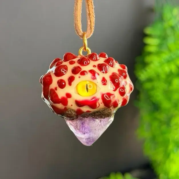 Bleeding tooth fungi protection charm ( glow in the dark )