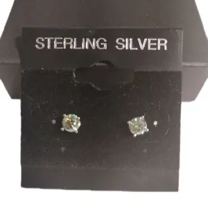 Stunning Green Moissanite Earrings .5 carat each stud. Full carat tw. 925 Sterling Silver