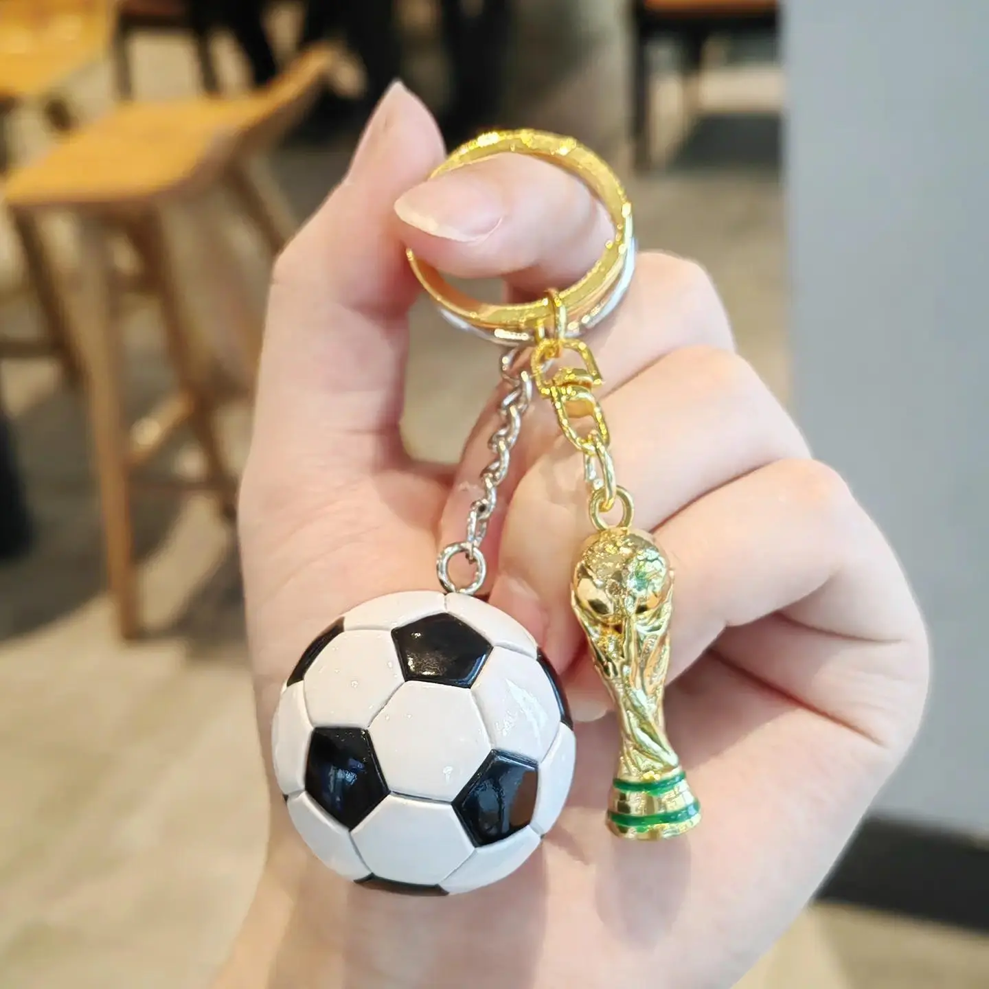 Black and white football + Golden Cup