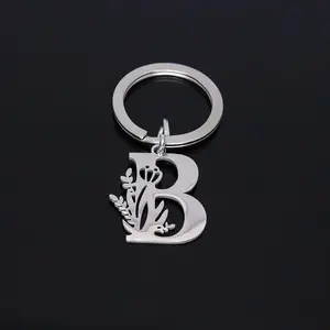 2024 New Fashion Stainless Steel Flowers ·26 Letters A-Z Pendant Keychain Pendant All-Match Bag Car Key Chain Pendant for Men And Women