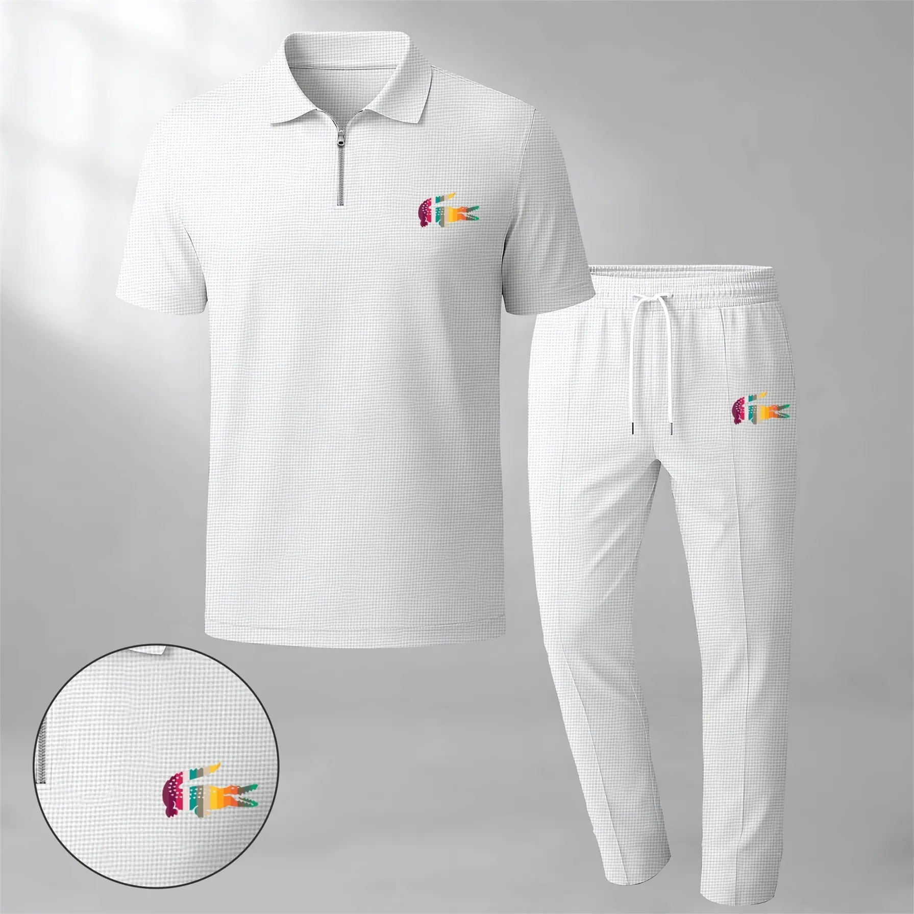 Men's two-piece set features a short-sleeve zip-collar polo shirt and matching trousers. Crafted from breathable, soft-textured waffle-knit fabric, it offers a comfortable, relaxed fit ideal for everyday casual wear.