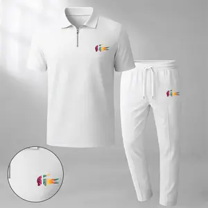 Men's two-piece set features a short-sleeve zip-collar polo shirt and matching trousers. Crafted from breathable, soft-textured waffle-knit fabric, it offers a comfortable, relaxed fit ideal for everyday casual wear.