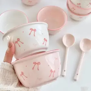 4 pcs ceramic tableware, Dinnerware set, with two bowls and two spoons, suitable for preparing cereals, oats, milk, and other foods, as well as holding desserts and snacks. Features a bow pattern, versatile, safe for use in microwaves and dishwashers
