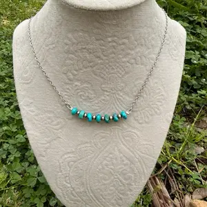 Turquoise and silver beaded necklace