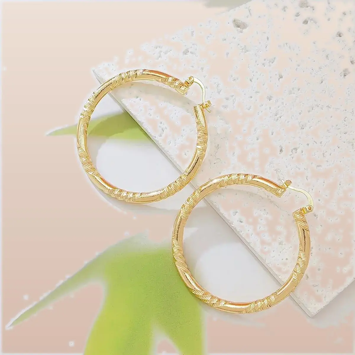 Women's twisted gold-tone huggie hoop earrings, faceted diamond-cut textured lightweight everyday jewelry