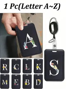 Black ID card holder, with a black retractable reel clip, printed with pink floral letter combinations, letters A-Z, anti-theft card holder, black thumb slot hard plastic card holder, expandable ID card holder, Retractable Badge Reel