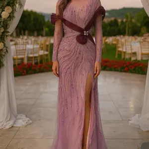 Long Sleeve Couture Gown with Embellished Design and High Slit for Special Occasions