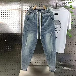 New Korean casual drawstring denim harem pants men's jeans spring and autumn fashion hip-hop loose hole washed jeans street wear beige