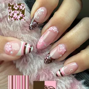 24pcs medium length almond Y2K press on nails nude pink and brown classic color blocking, pink brown white stripes, cute French manicure, 3D pink flowers, stars, Nail Designs, suitable for spring outings and shopping fake nails Nail Art Design