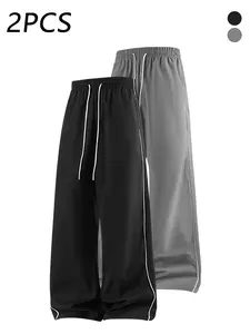 2-pack men’s casual athletic pants with side stripes, adjustable drawstring elastic waistband, loose straight-leg fit