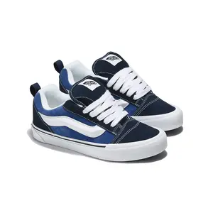 Knu Skool Navy/True White Reissued 90s Low Top Shoe with Puffed Tongue 3D-Molded Sidestripe & Chunky Laces Style VN0009QCNWD1