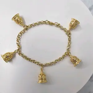 pulso de oshun con 5 campanas laminadas en oro -oshun bracelet with five gold plated bells