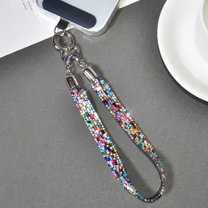Luxury full-diamond crystal sequin phone lanyard, wide wrist strap, fashionable women's pendant, beautiful accessory, outdoor travel, hiking, shopping, anti-loss phone case chain, niche, personalized, high-end new style.