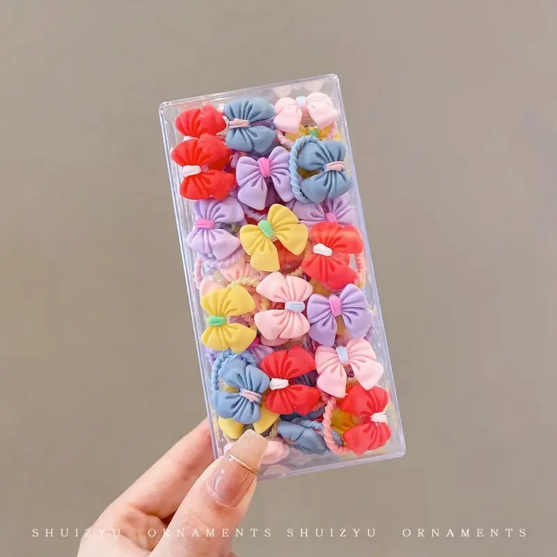 30 bow ties in a box